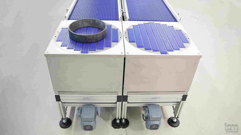 Sie sehen hier einen Zahnriemenförderer. Zahnriemenförderer